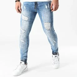 Coupon 🎉 Jogger Pant Skinny 👖 Jeans Avec Dechirures LB054J Denim Bleu Medium de LBO ⌛